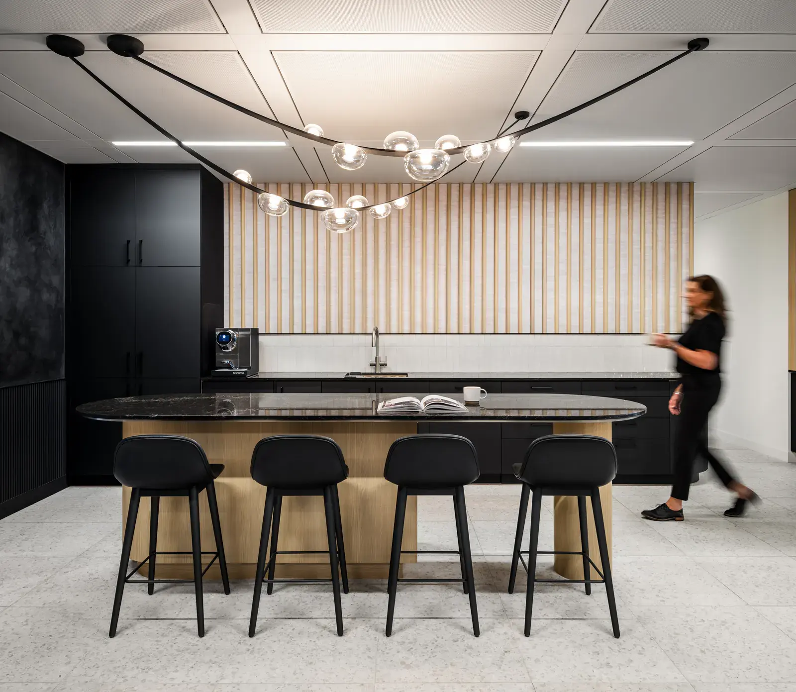 Café counter and stools in the Waypoint Insurance workplace