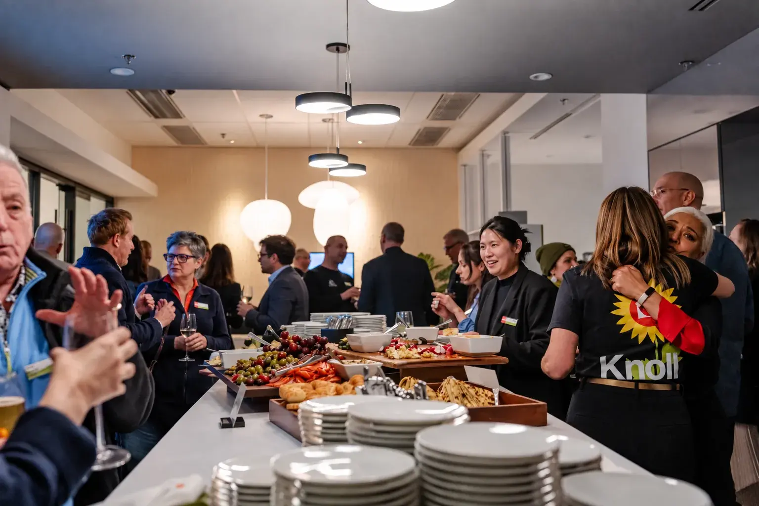 Guests gathered around food and conversation at the Blackburn Young Spring Party