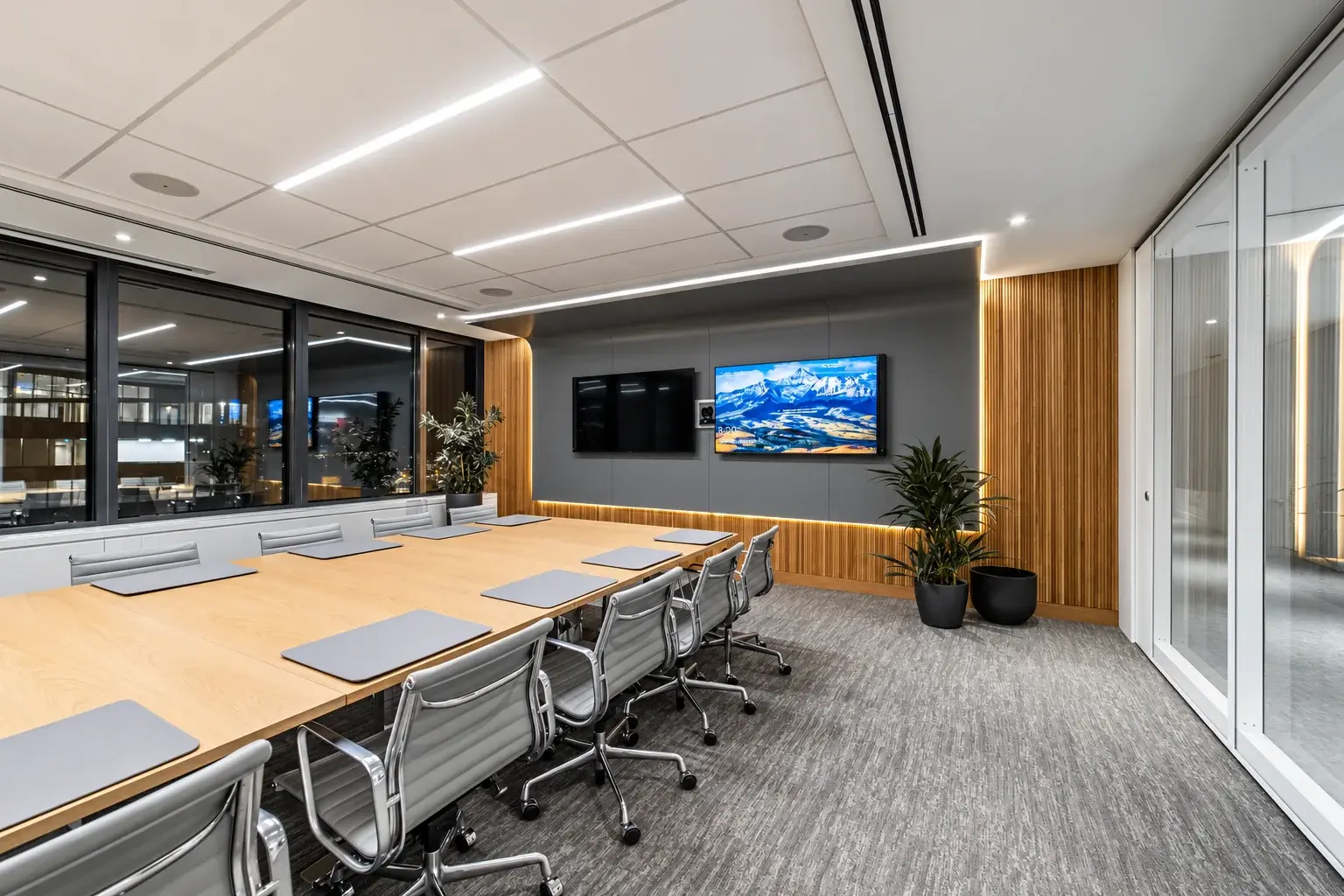 Osler boardroom with a long conference table and Vancouver views