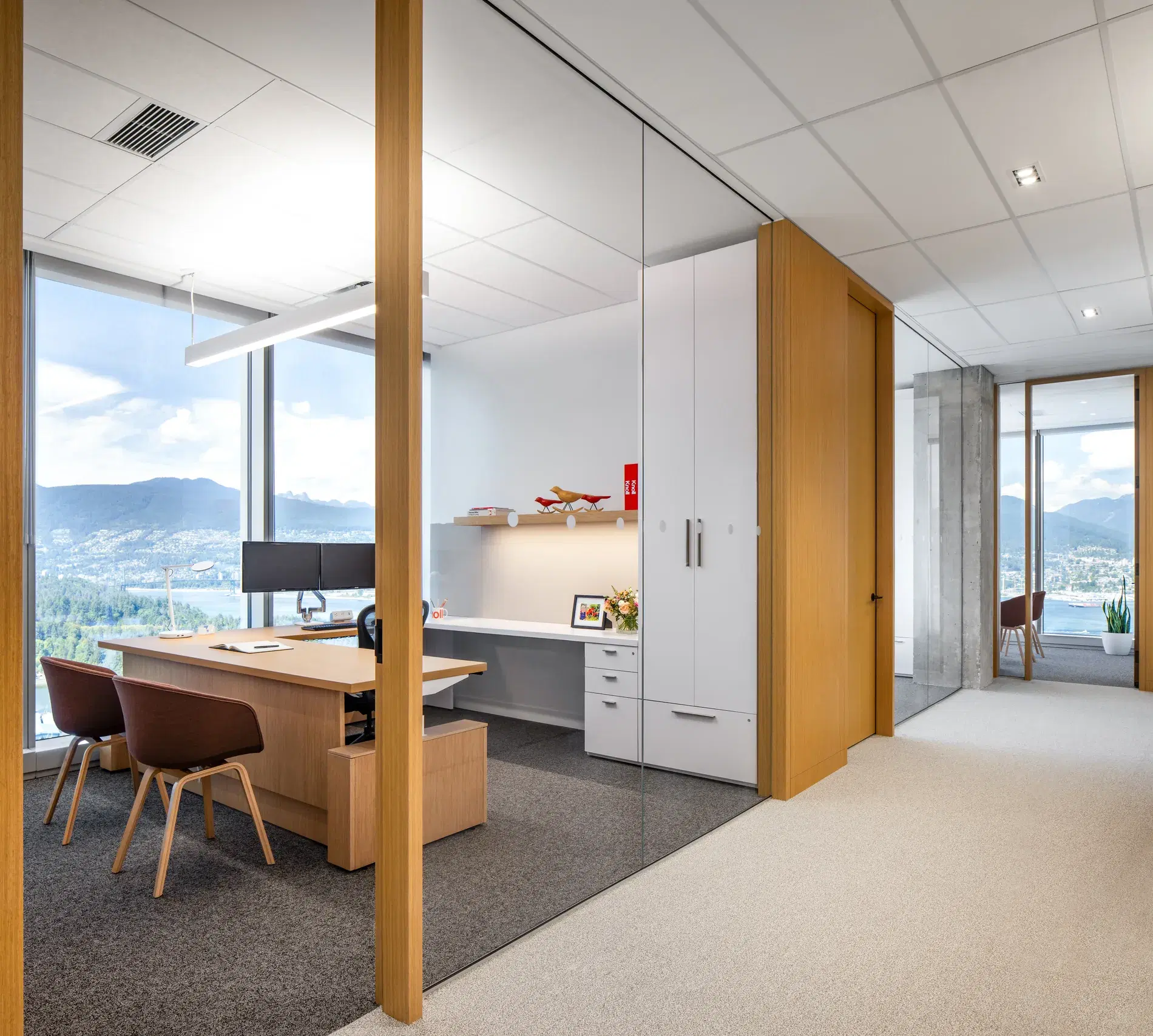 Private office suite with glass-fronted rooms