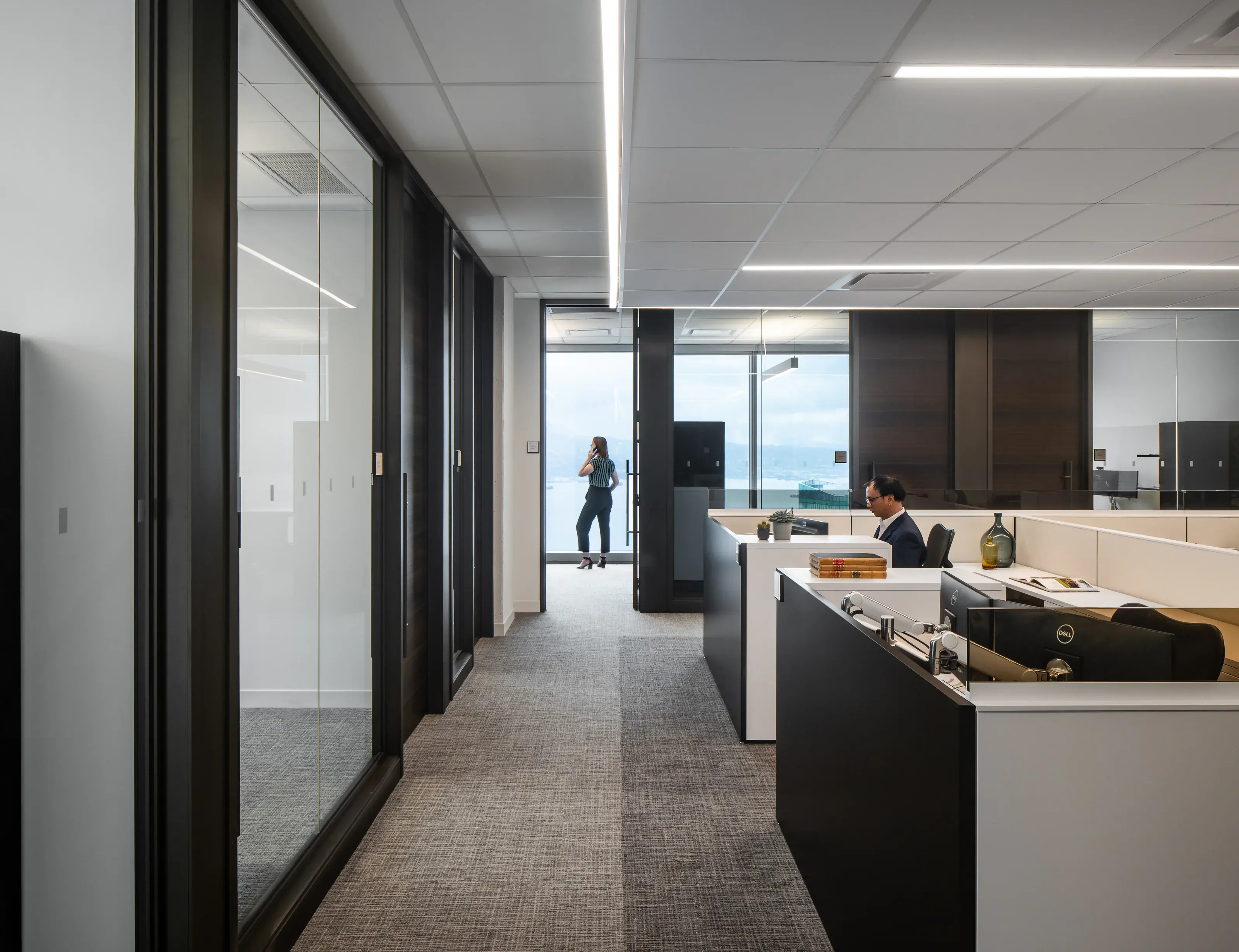 DLA Piper workstation area with glazed offices and views across Vancouver